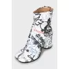 Tabi leather ankle boots with tag