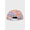 Woven cap in a combination of colors