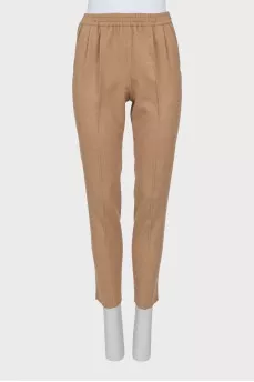Beige trousers with elastic waistband and arrows