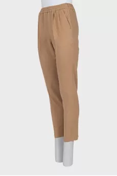 Beige trousers with elastic waistband and arrows