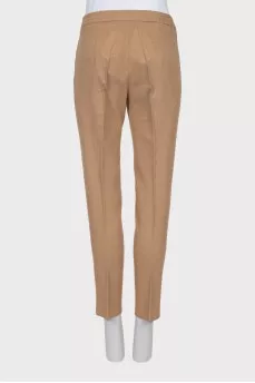 Beige trousers with elastic waistband and arrows