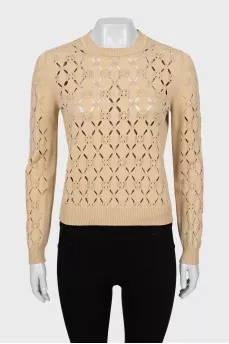 Beige sweater with a pattern
