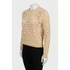 Beige sweater with a pattern