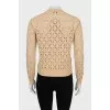 Beige sweater with a pattern
