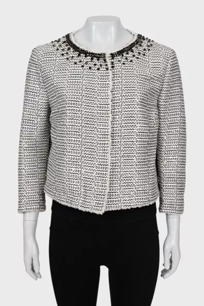 Jacket decorated with sequins and rhinestones