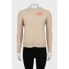 Wool sweater with embroidered print