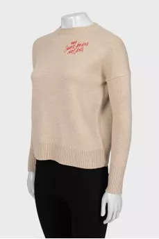 Wool sweater with embroidered print