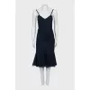 Dress with straps decorated with a bow