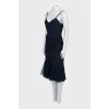 Dress with straps decorated with a bow