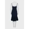 Dress with straps decorated with a bow
