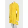 Yellow dress elongated at the back
