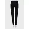 High-waisted trousers with creases