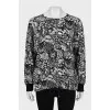 Loose fit jumper with ties