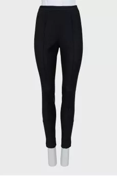 Trousers with stitched creases
