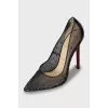 Mesh shoes decorated with rhinestones