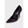 Suede shoes decorated with hearts