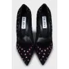 Suede shoes decorated with hearts