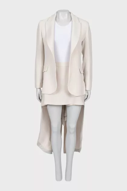 Beige suit with tailcoat and skirt