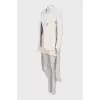 Beige suit with tailcoat and skirt