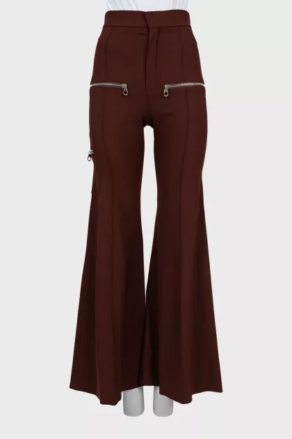 Flared trousers decorated with zippers