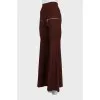 Flared trousers decorated with zippers