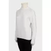White turtleneck sweater