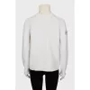 White turtleneck sweater