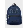 Mini backpack decorated with embroidery