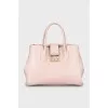 Pink leather bag with gold hardware