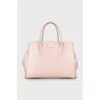 Pink leather bag with gold hardware