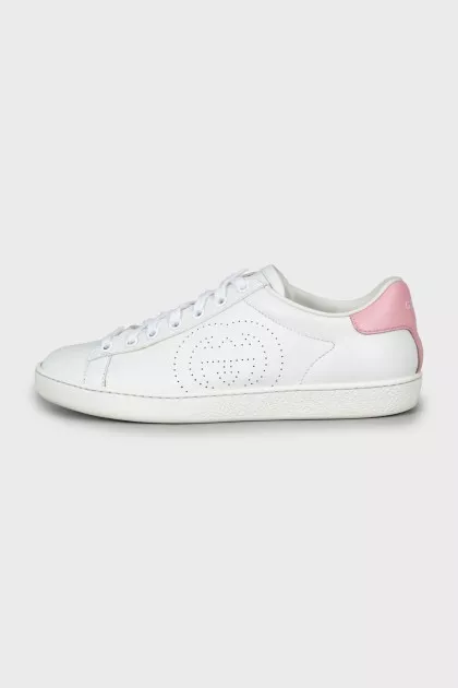 White leather sneakers with brand logo
