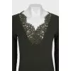 Knitted dress with a deep neckline