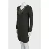 Knitted dress with a deep neckline