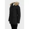 Black parka with fur on the hood