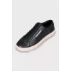 Leather sneakers with contrast sole