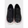 Leather sneakers with contrast sole