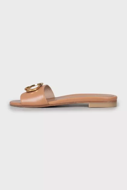 Brown leather flip flops with decor