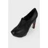 Black smooth leather ankle boots