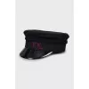 Wool cap with tag