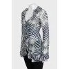 Animal print blouse with ruffles
