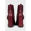 Red ankle boots with perforation
