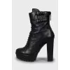 Leather ankle boots decorated with buckles