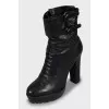 Leather ankle boots decorated with buckles