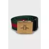 Textile belt with gold buckle