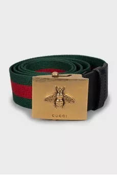 Textile belt with gold buckle