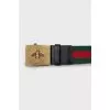 Textile belt with gold buckle