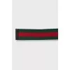 Textile belt with gold buckle