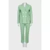 Green suit with tag