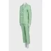 Green suit with tag