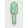 Green suit with tag